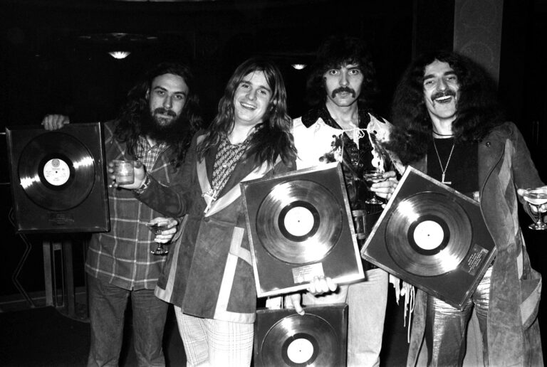 Bill Ward, Ozzy Osbourne, Tony Iomma and Geezer Butler of Black Sabbath photographed with gold discs in 1973.© Michael Putland / Retna UK.Credit all uses